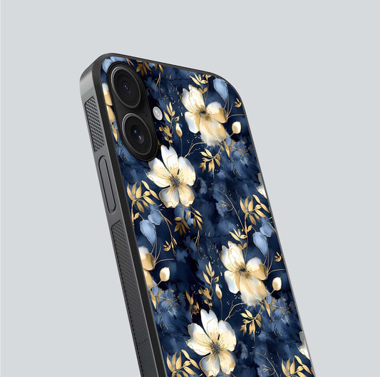 Golden Midnight Bloom Glass Case for iPhone 16 close-up angled shot showing floral detail and reflection shine
