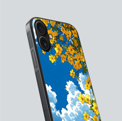 Golden Petal Sky Glass Case for iPhone 16 close-up angled shot showing petal texture and shine reflection