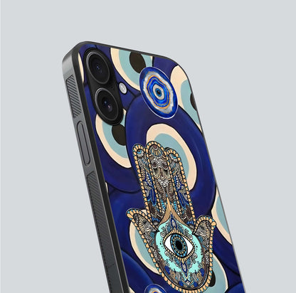 Hamsa Divine Guard Glass Case for iPhone 16 close-up angled shot showing detailed palm motif and reflection glow
