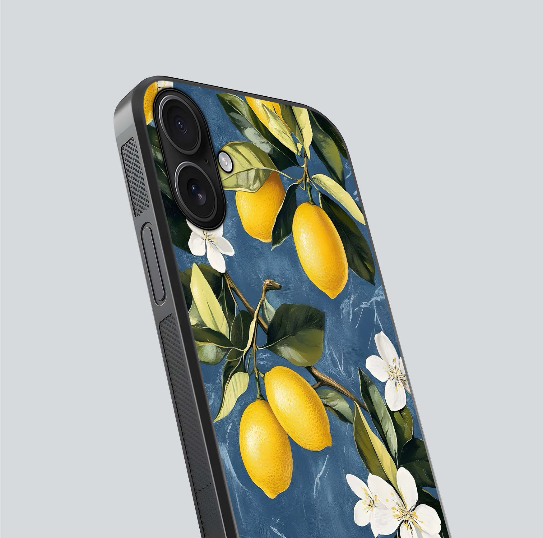 Lemon Dream Garden Glass Case for iPhone 16 close-up angled shot showing fruit details and shine reflection
