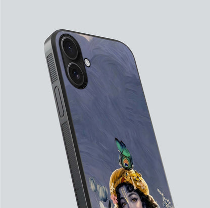 Lord Krishna Glass Case for iPhone 16 angled close-up showing intricate flute and reflection details