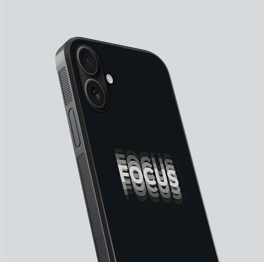 Mono Focus Vision Glass Case for iPhone 16 close-up angled shot highlighting minimal contrast and reflection