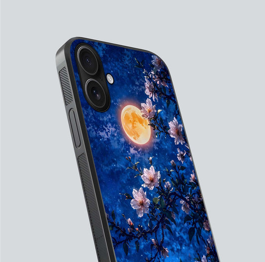Moonlit Blossoms Night Glass Case for iPhone 16 close-up angled shot showing petal glow and reflection detail