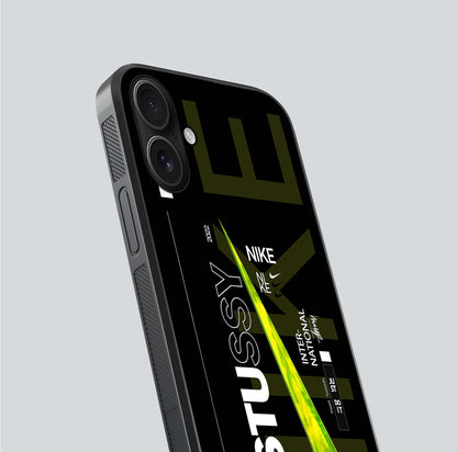 Neon Street Edition Glass Case for iPhone 16 close-up angled shot showing urban neon lights and shine