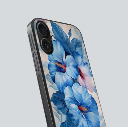Ocean Hibiscus Grace Glass Case for iPhone 16 close-up angled shot highlighting floral glow and HD shine