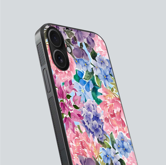 Pastel Floral Mix Glass Case for iPhone 16 close-up angled shot highlighting flower detail and reflection