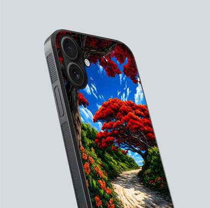 Red Trees Pathway Glass Case for iPhone 16 close-up angled shot highlighting forest detail and reflection