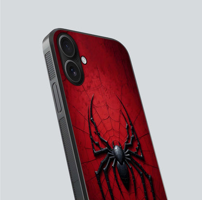 Venom Web Emblem Glass Case for iPhone 16 close-up angled shot highlighting sharp logo lines and reflection