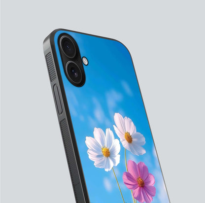 Triple Flowers With Sky Glass Case for iPhone 16 close-up angled shot highlighting petal and reflection details