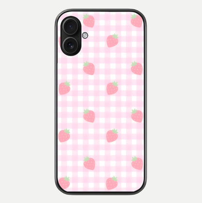 Strawberry Picnic Love iPhone 16 Plus glass phone case front view featuring cute strawberry picnic artwork with romantic vibe