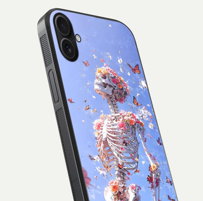 Bloom Beyond Bones Glass Case for iPhone 16 Plus close-up highlighting unique bone-floral fusion art and reflection