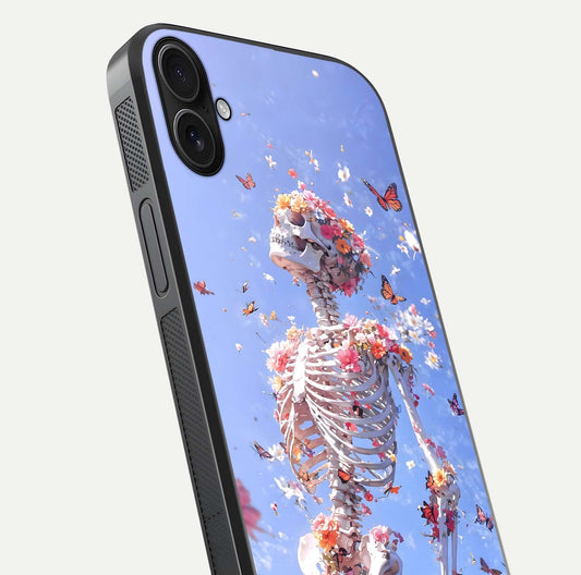 Bloom Beyond Bones Glass Case for iPhone 16 Plus close-up highlighting unique bone-floral fusion art and reflection