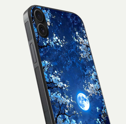Blossom Moonlight Sky Glass Case for iPhone 16 Plus close-up angle capturing moon glow and flower detail reflections