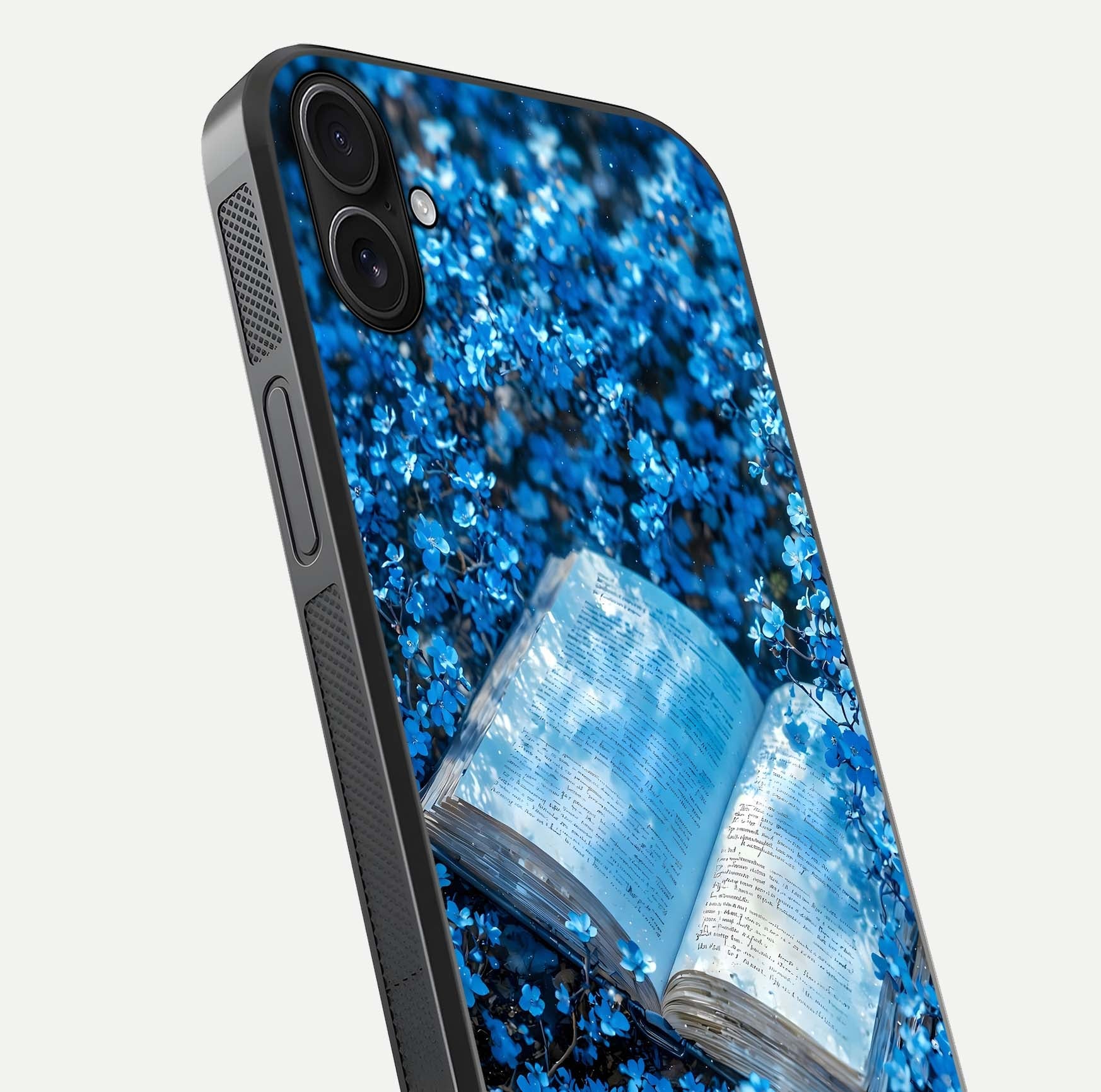 Blue Bloom Tales Glass Case for iPhone 16 Pro close-up angle showing petal texture and blue tone reflection