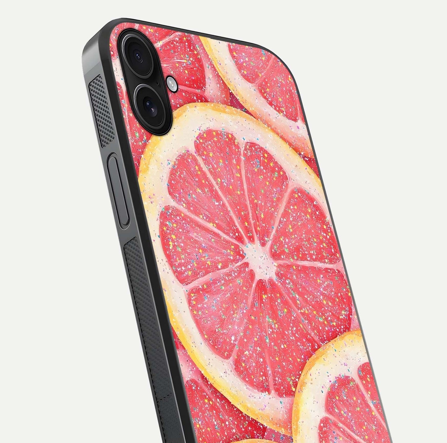 Glitter Grapefruit Glass Case for iPhone 16 Plus close-up angled shot showing fruit texture and glitter reflection