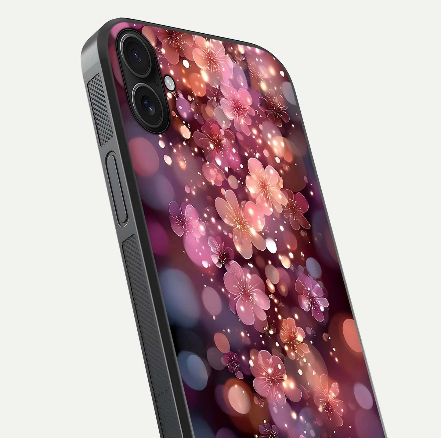 Glowing Petal Bliss Glass Case for iPhone 16 Plus close-up angled shot showing petal glow, color depth, and reflection shine