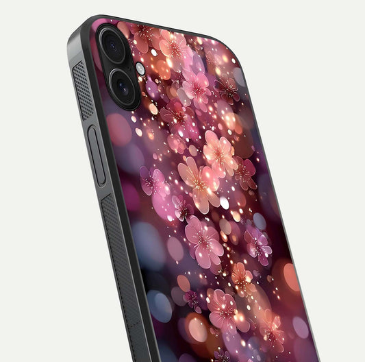 Glowing Petal Bliss Glass Case for iPhone 16 Plus close-up angled shot showing petal glow, color depth, and reflection shine