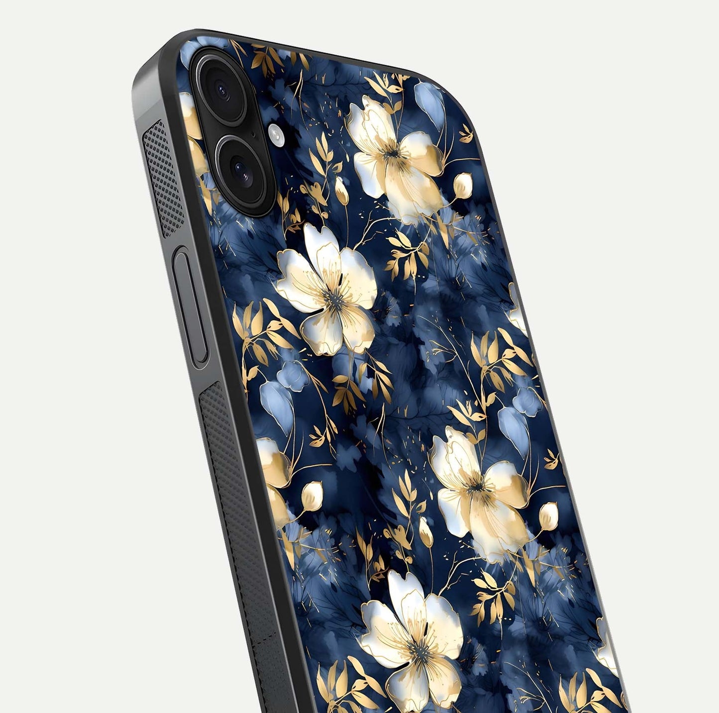 Golden Midnight Bloom Glass Case for iPhone 16 Plus close-up angled shot showing floral detail and reflection shine