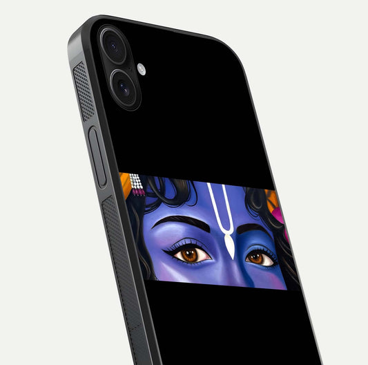 Krishna Eye Glass Case for iPhone 16 Plus close-up angled shot showing intricate artwork and reflection shine