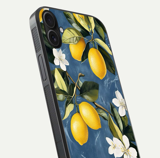 Lemon Dream Garden Glass Case for iPhone 16 Plus close-up angled shot showing fruit details and shine reflection