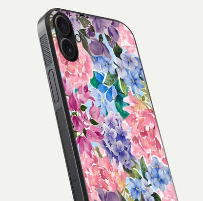 Pastel Floral Mix Glass Case for iPhone 16 Plus close-up angled shot highlighting flower detail and reflection