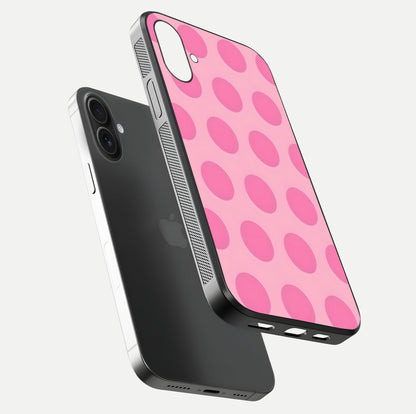 Sweet Dot Dreams iPhone 16 Plus glass phone case floating view emphasizing glossy surface and soft playful styling
