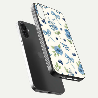 Blue Flower & Bow Glass Case for iPhone 16 Plus floating mockup capturing gloss reflection and girly aesthetic