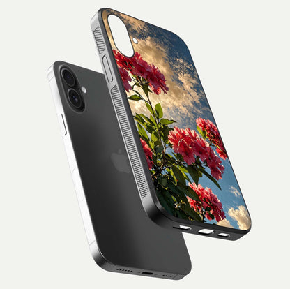 Red Bloom Skies Glass Case for iPhone 16 Plus floating dual-view mockup showing glass gloss and floral pattern