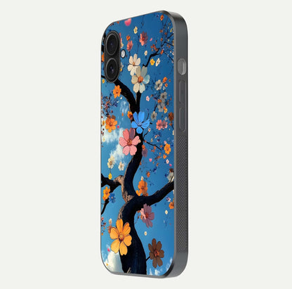 Blossom Dream Sky Glass Case for iPhone 16 Pro side-angle photo showing flower details, edge curve, and reflection shine
