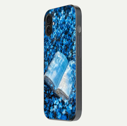 Blue Bloom Tales Glass Case for iPhone 16 Pro side-angle image showing blue floral pattern and glossy finish