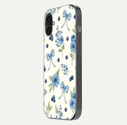 Blue Flower & Bow Glass Case for iPhone 16 Plus side-angle image showing bow-floral mix and HD finish shine