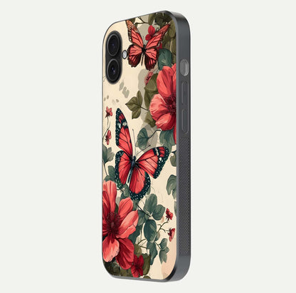 Crimson Butterfly Garden Glass Case for iPhone 16 Plus side-angle photo capturing gloss texture and soft tone