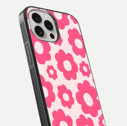 Blush Flower Pop iPhone 16 Pro glass phone case angled back view highlighting bright floral pop design and side grip texture