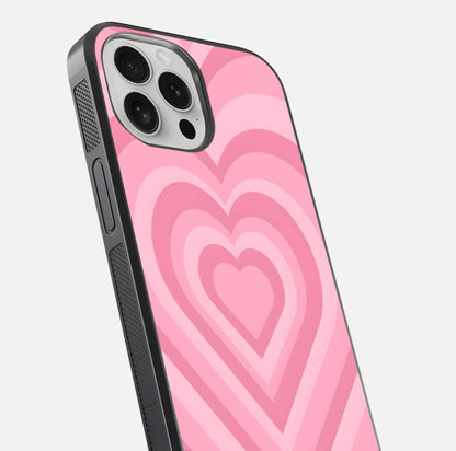Blush Heart Waves iPhone 16 Pro glass phone case angled back view highlighting romantic heart wave artwork and grip texture