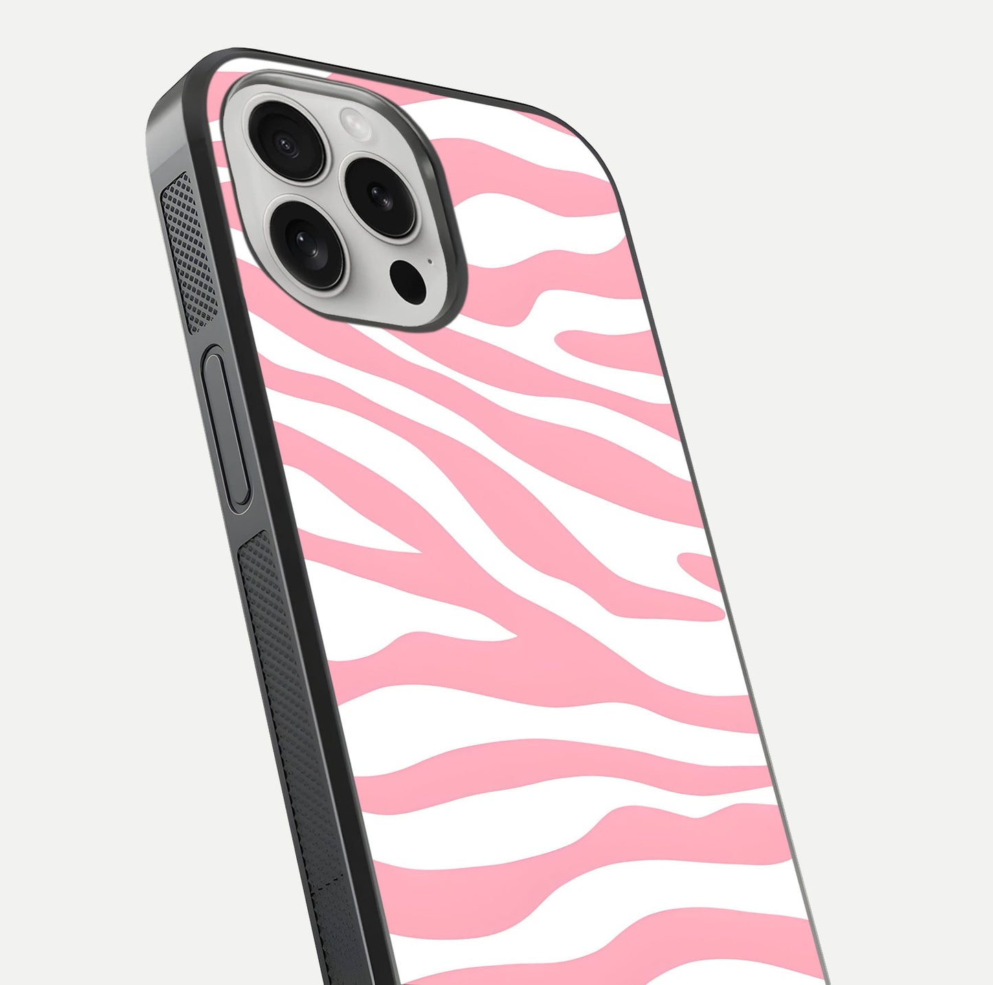 Blush Zebra Flow iPhone 16 Pro glass phone case angled back view highlighting bold zebra artwork and textured side grip
