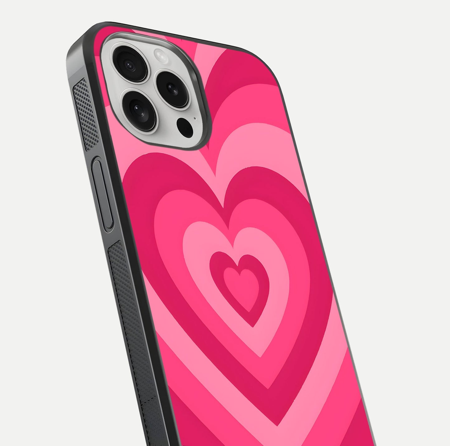 Layered Love Hearts iPhone 16 Pro glass phone case angled back view highlighting heart artwork and textured grip edges