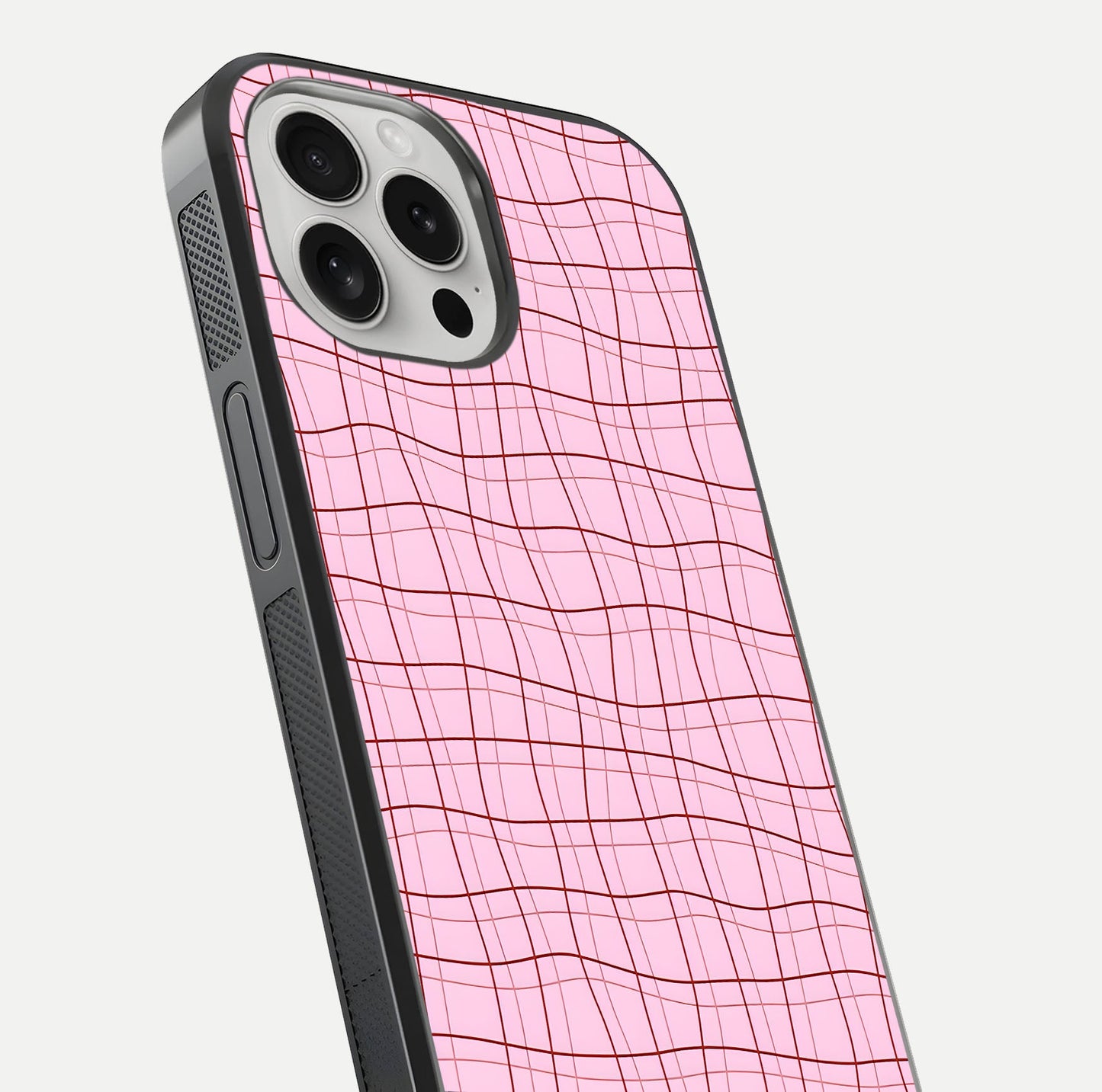 Soft Grid Bliss iPhone 16 Pro glass phone case angled back view highlighting grid artwork and side grip texture