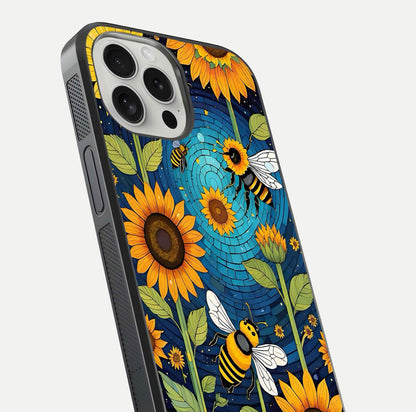 Bees & Sunflowers Glass Case for iPhone 16 Pro close-up angled shot showing detailed petals, bee prints, and glass reflection