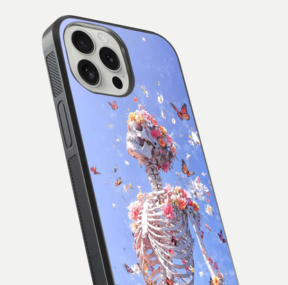 Bloom Beyond Bones Glass Case for iPhone 16 Pro close-up highlighting unique bone-floral fusion art and reflection