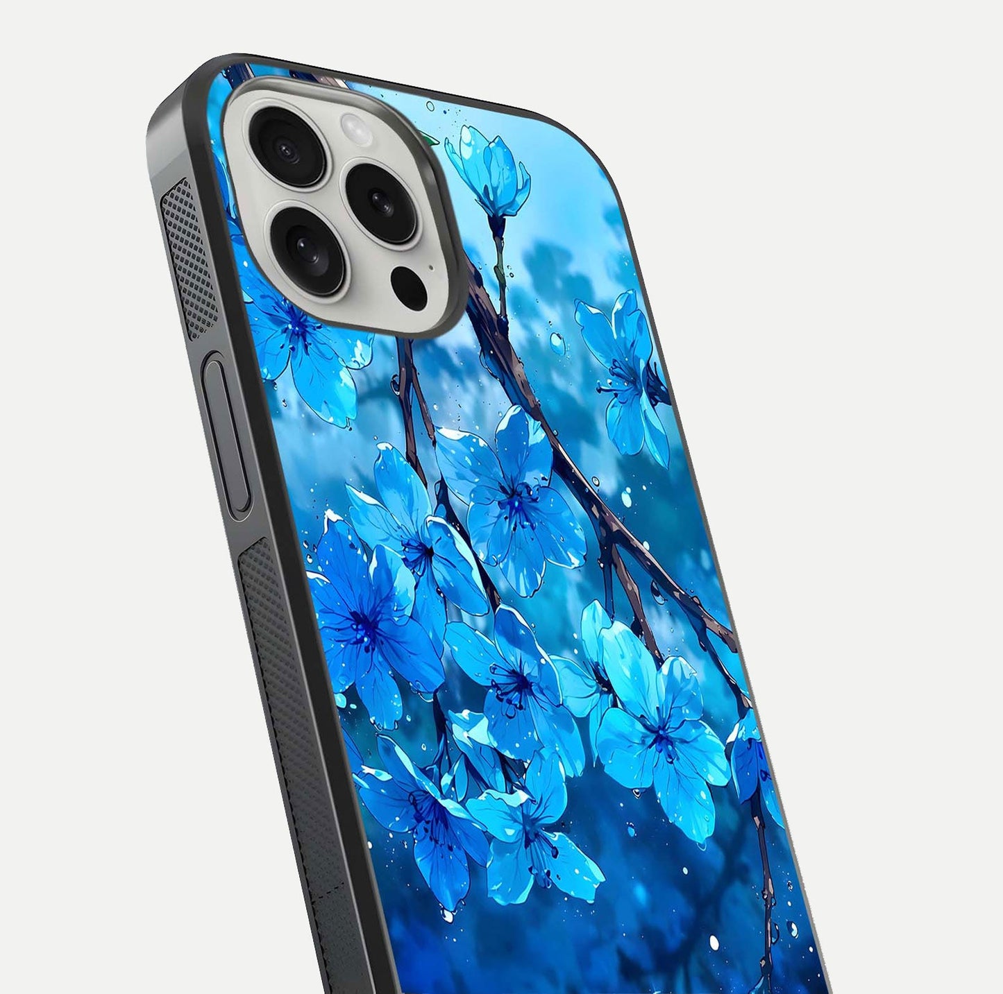 Blue Blossoms Branch Glass Case for iPhone 16 Pro close-up angle highlighting petal details and reflection gloss