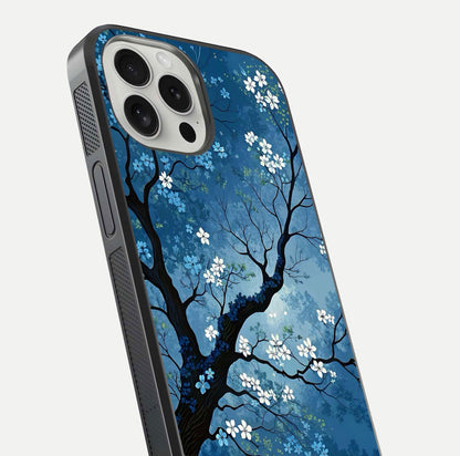 Blue Tree Serenity Glass Case for iPhone 16 Pro close-up view highlighting tree branches and reflection gloss
