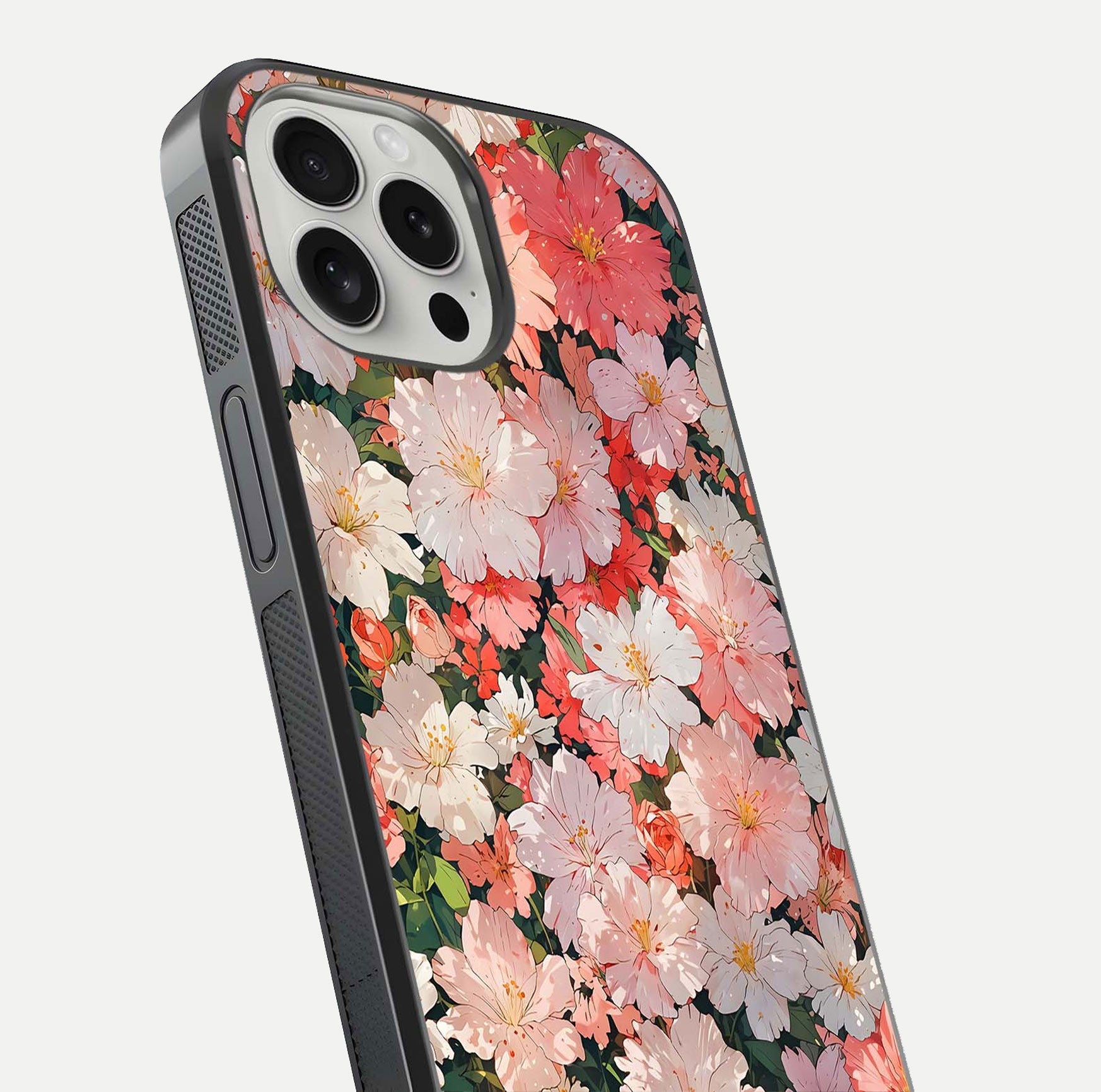 Blush Bloom Field Glass Case for iPhone 16 Pro close-up shot capturing pastel flower field tones and gloss shine