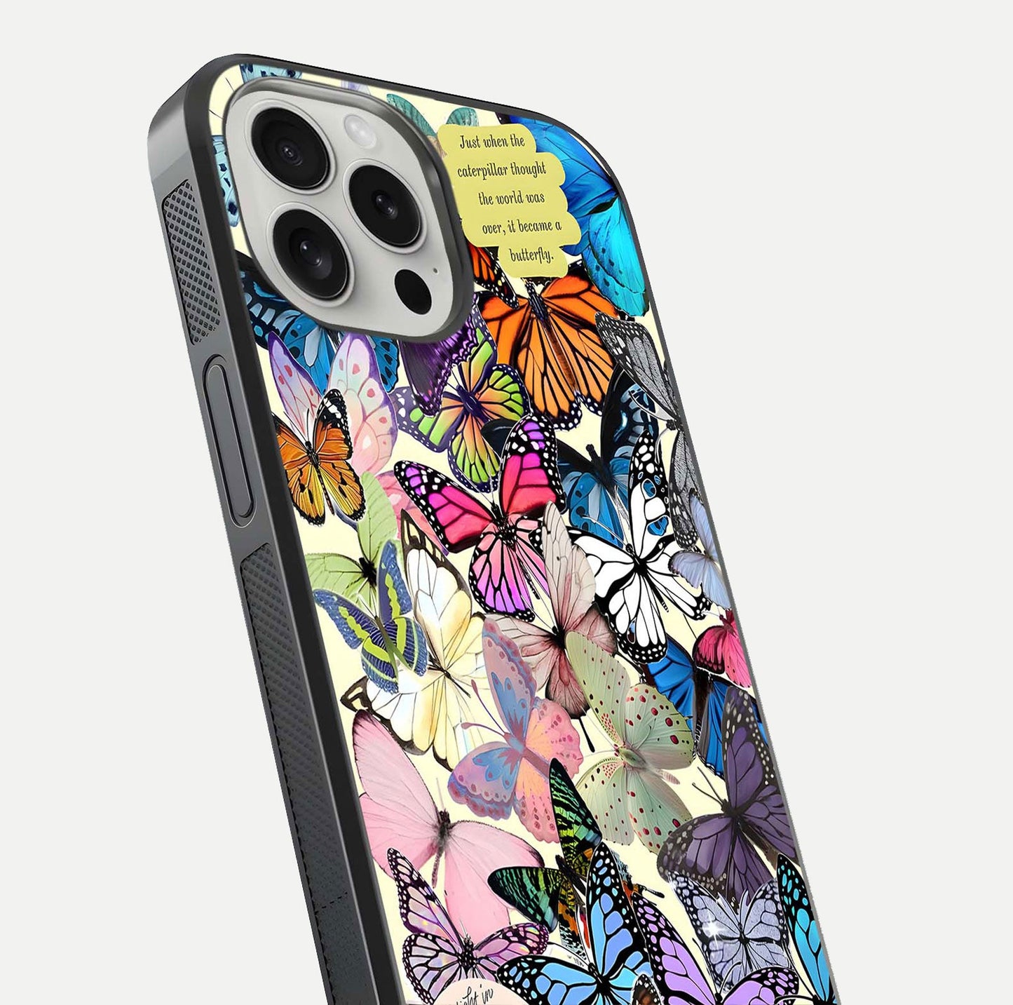 Butterflies Petal Dream Glass Case for iPhone 16 Pro close-up highlighting butterfly wings and pink petal gloss