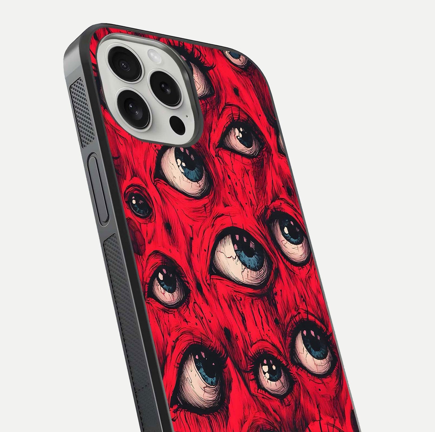 Crimson Watch Eyes Glass Case for iPhone 16 Pro close-up highlighting graphic detail and reflection