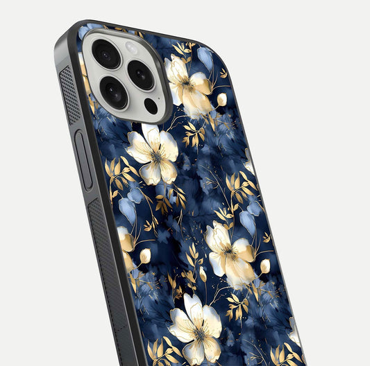 Golden Midnight Bloom Glass Case for iPhone 16 Pro close-up angled shot showing floral detail and reflection shine