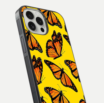 Golden Wing Flight Glass Case for iPhone 16 Pro close-up angled shot showing metallic wing texture and shine detail