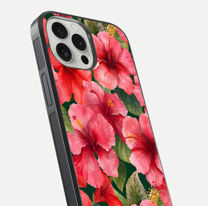 Hibiscus Pattern Glass Case for iPhone 16 Pro close-up angled shot showing flower details and gloss reflection