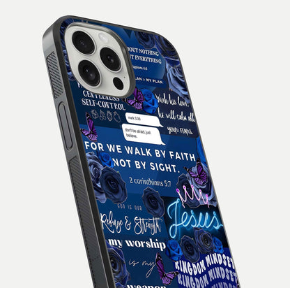 Kingdom Faith Glow Glass Case for iPhone 16 Pro close-up angled shot showing luminous text and divine reflection