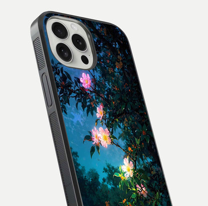 Midnight Bloom Glow Glass Case for iPhone 16 Pro close-up angled shot showing petal highlights and glow reflection