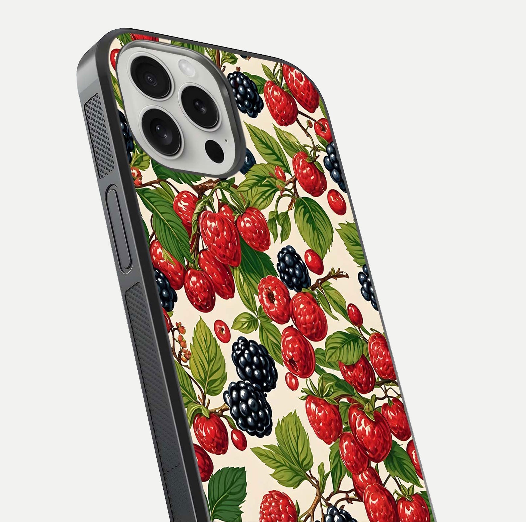 Mixed Berry Collage Glass Case for iPhone 16 Pro close-up angled shot showing fruit detail and reflection glow